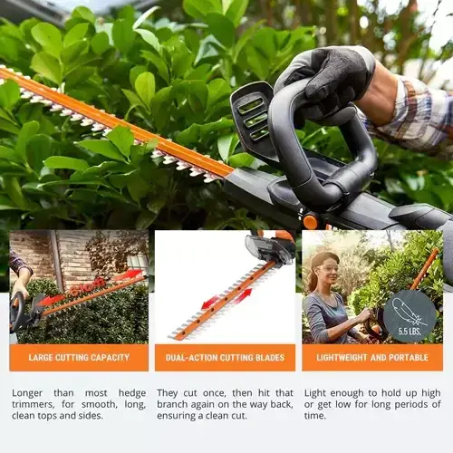 WG259E-WORX-CORDLESS-HEDGE-TRIMMER-20V-61CM-1 Hand holding cordless hedge trimmer cutting green plants with feature callouts showing cutting capacity and blade design